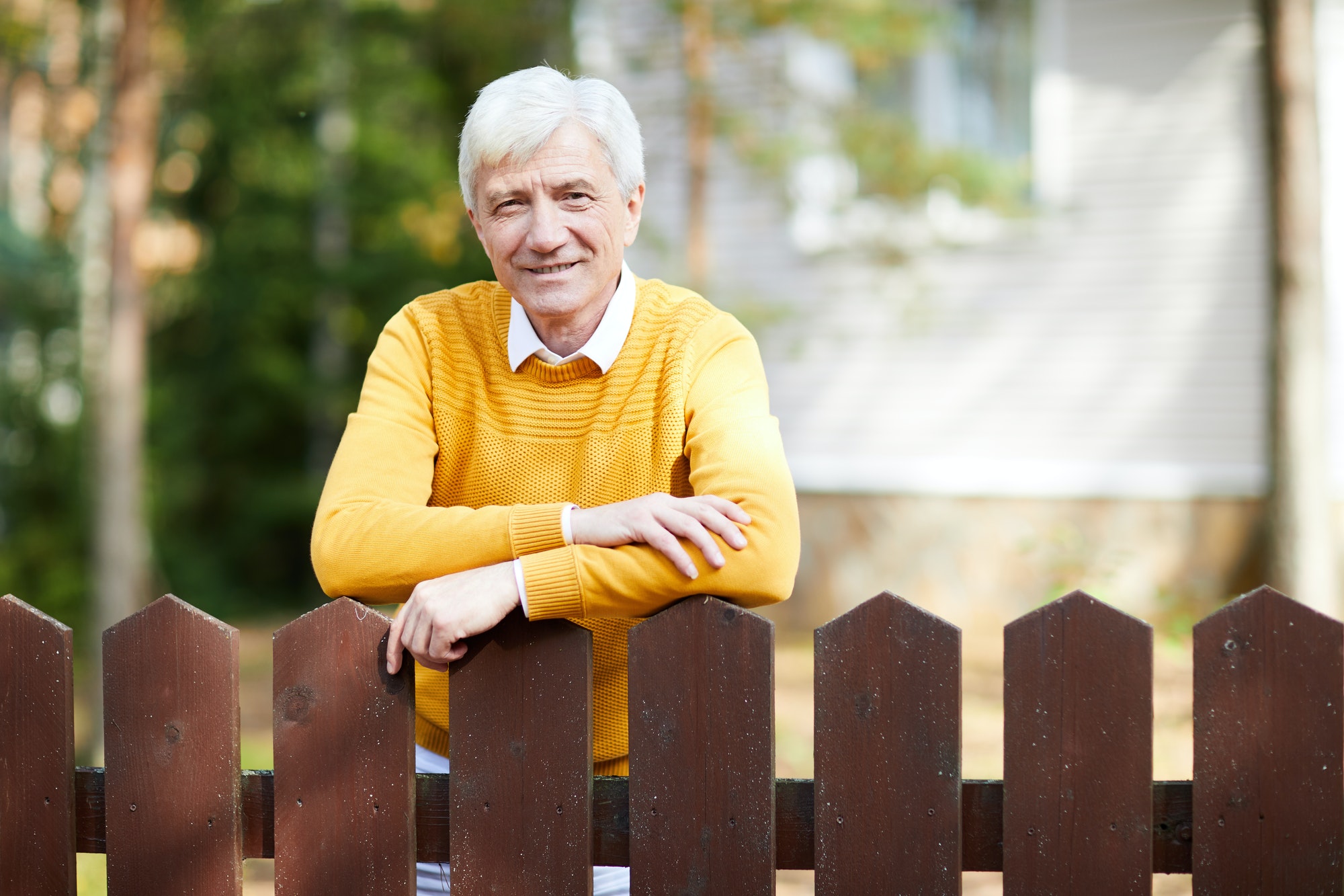 Man by fence